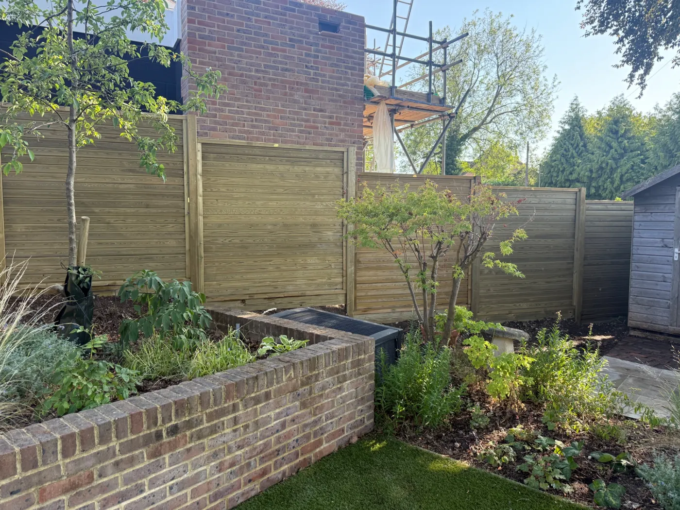 Modern horizontal panel garden fencing completed in Surrey