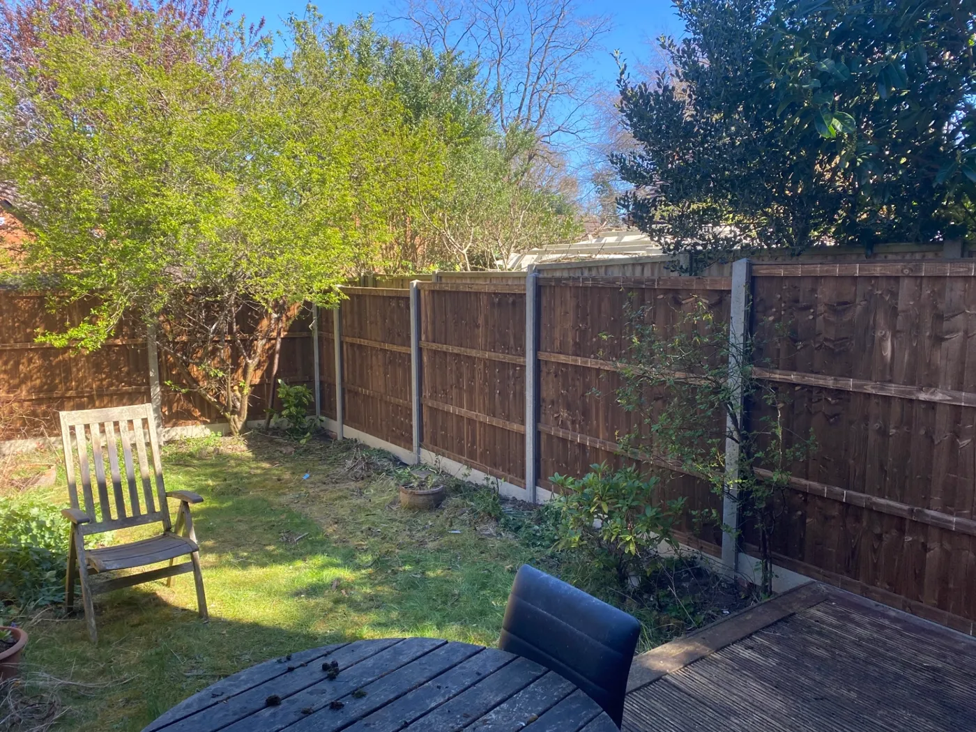 Replacement closeboard fencing installed around a rear garden in Surrey