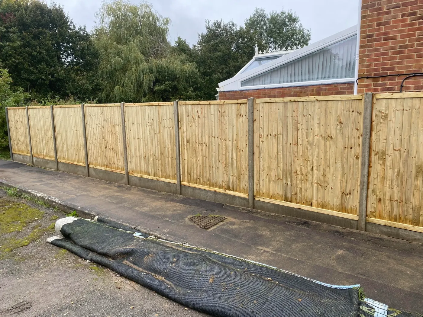 Tongue and groove fence panels fitted in Surrey